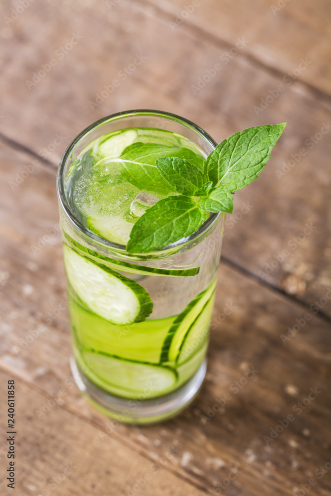 Fresh cucumber and mint in glass. Detox water. Health Fresh cucumber and mint in glass. Detox water. Health