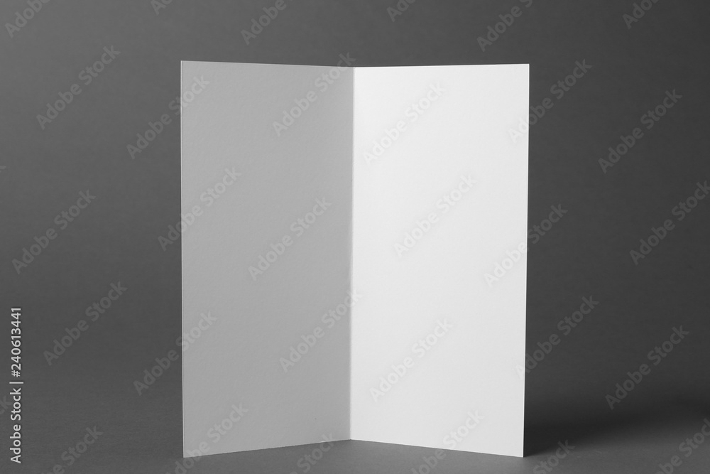 Blank brochure on gray background. Mock up for design Blank brochure on gray background. Mock up for design