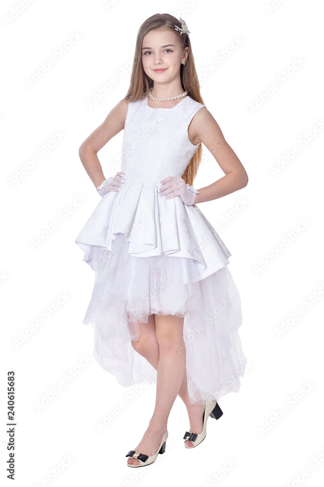 Happy little girl in carnival costume posing isolated on white background