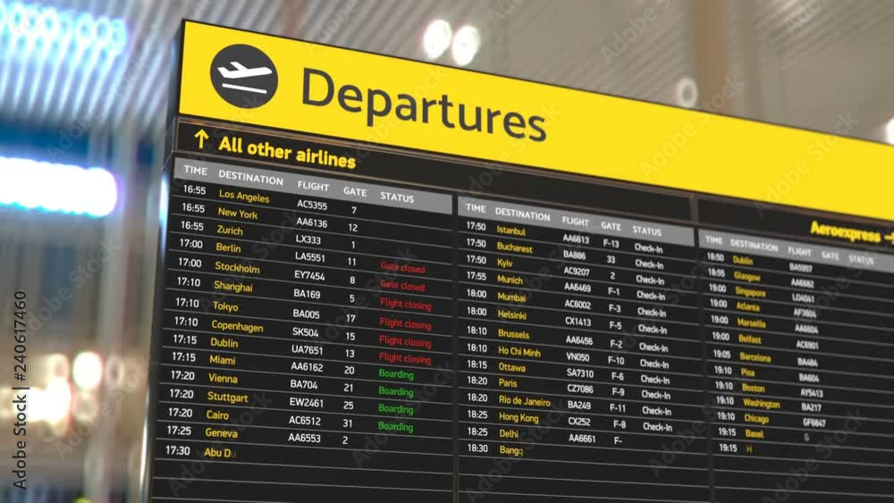 Airport departure board with updating flight information