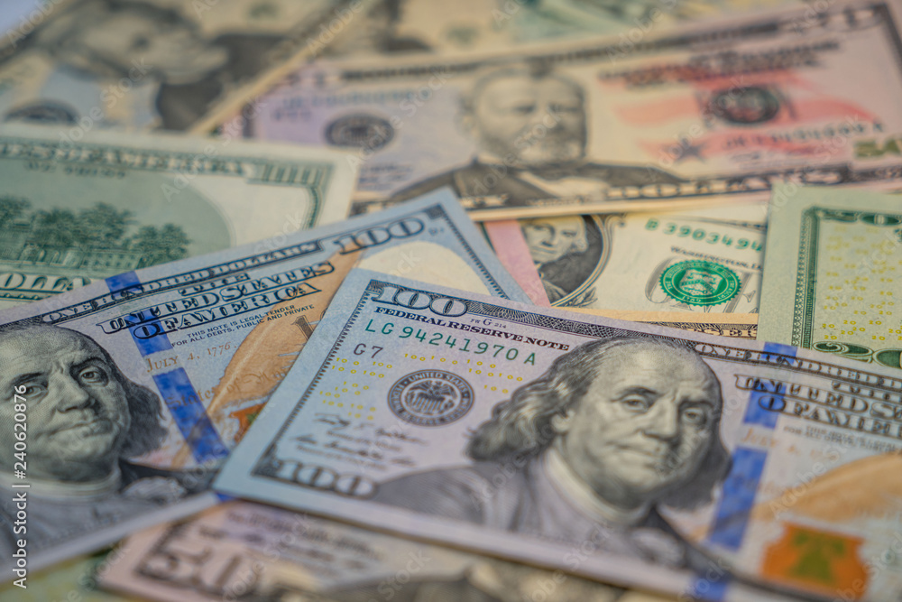 background of various US dollar banknotes background of various US dollar banknotes