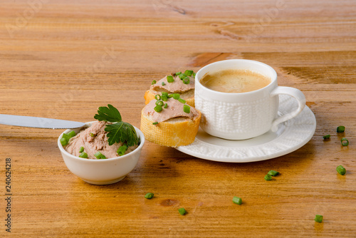 healthy breakfast with coffee and sandwiches, on a wooden table