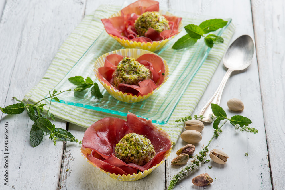 ricotta cheese meatballs with pisctachio nuts over bresaola ricotta cheese meatballs with pisctachio nuts over bresaola