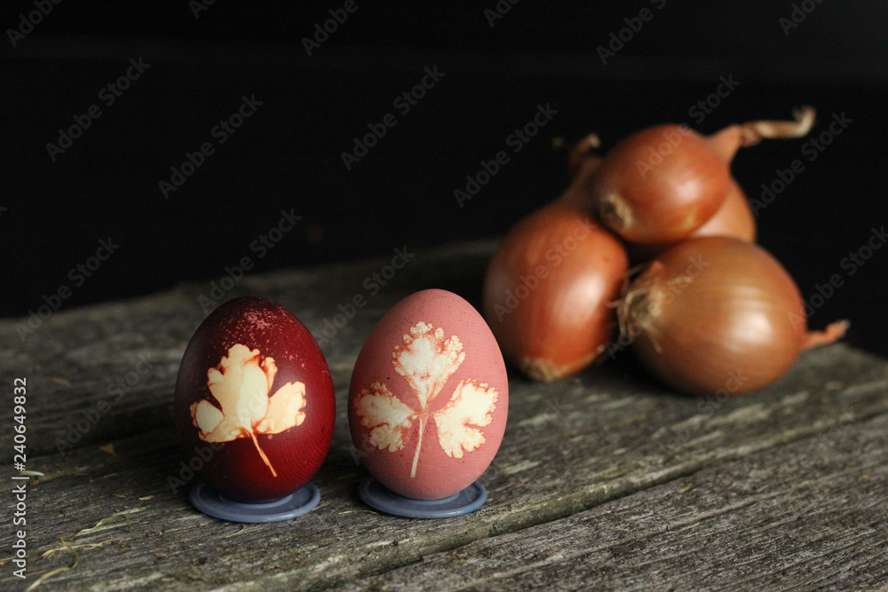 Easter Eggs Decorated with Natural Grass and Boiled in Onions Peels, Rural Style.painting eggs with natural dyes. Easter Eggs Decorated with Natural Grass and Boiled in Onions Peels, Rural Style.painting eggs with natural dyes.