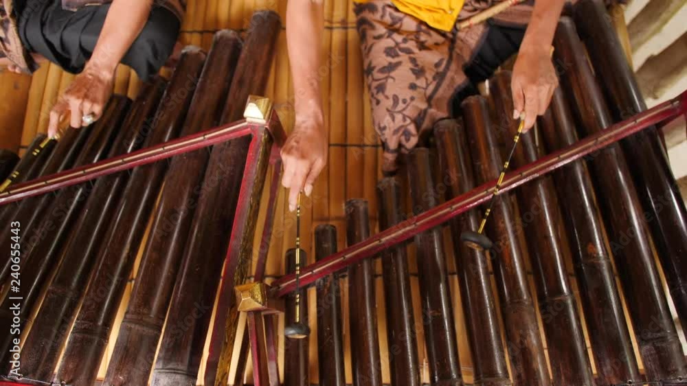 Traditional Balinese Music Instument Gamelan. Asian Musician Man in