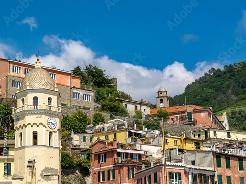 Vernazza summer view with the bell tower of the Church of Santa Margherita d'Antiochia in the foreground, Cinque Terre, Italy
