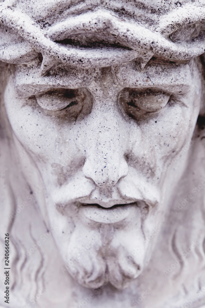 Antique statue  of  Jesus Christ crown of thorns. Religion concept.