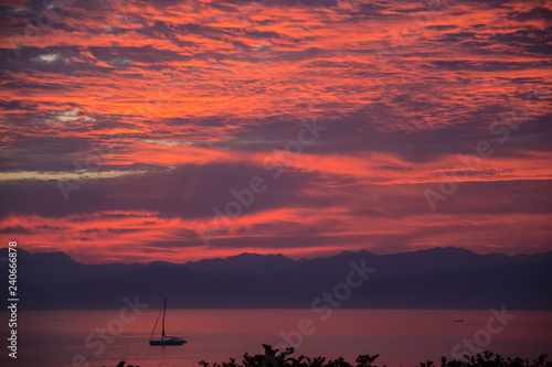 Fiery sunrise over the bay near Punta de Mita, near Bucerias and Puerta Vallarta, Mexico