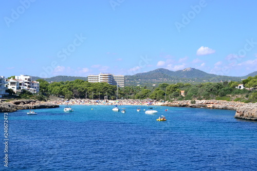 Turquoise water and rocks at Cala Marcal beach and Cala d'Or city, Palma Mallorca Island, Spain