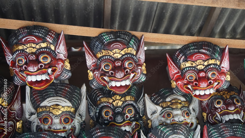 Balinese masks on a background Balinese masks on a background