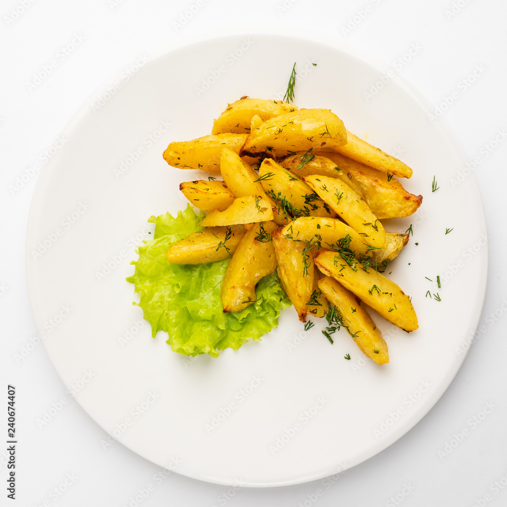 fried potatoes on the white plate fried potatoes on the white plate