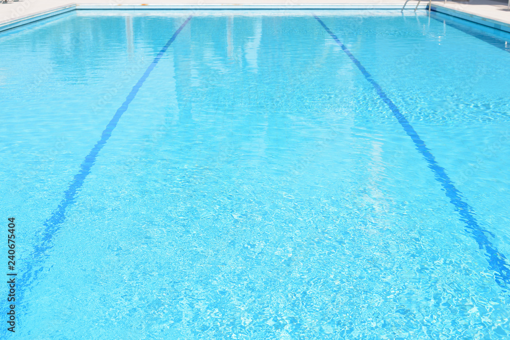 Blue water and laens in swimming pool