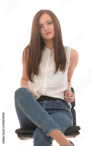 young successful woman sitting in a chair