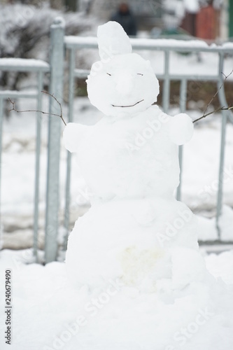 Little snowman, snowy winter in Kiev, Ukraine © Алексей Мовсесян