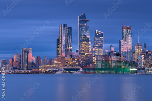 Midtown Manhattan view at night from Hudson river with long exposure