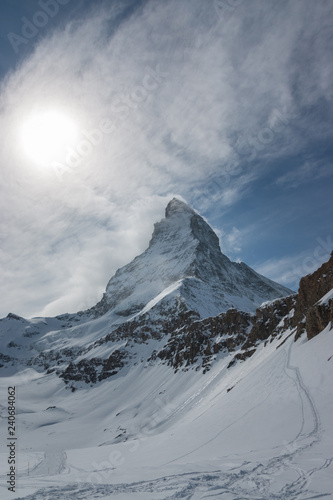 Majestic Matterhorn mountain in front of a partly cloudy sky  © A. Emson