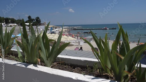 Odessa, Ukraine - 8th of June 2017: 4K At the Arkadya beach - Peeping of one of the beaches in Arkadya district photo