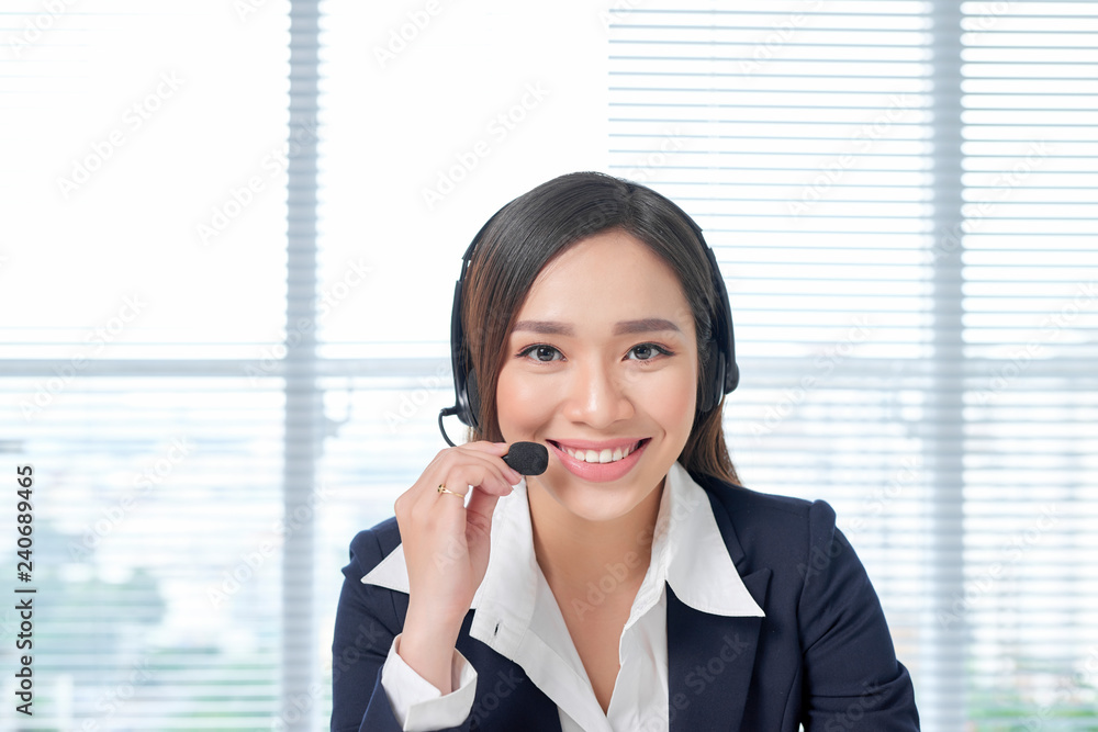 Call center operators. Young beautiful business woman in headset Call center operators. Young beautiful business woman in headset