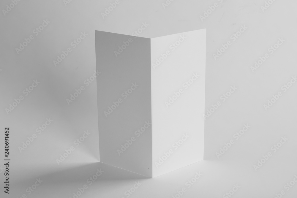 Blank brochure on white background. Mock up for design Blank brochure on white background. Mock up for design