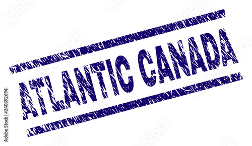 ATLANTIC CANADA seal print with scratced style. Blue vector rubber print of ATLANTIC CANADA text with unclean texture. Text label is placed between parallel lines.