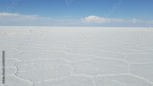 The Uyuni Salar in Bolivia. Close up video of the bright white hexagon salt flats. Uyuni, Potosi Bolivia.