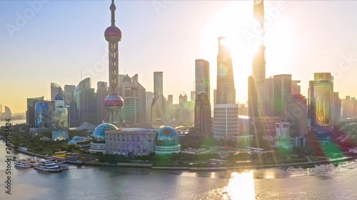 China Shanghai Aerial v44 Hyperlapse flying around landmark waterfront, financial center, with sunlight glare 10/18
