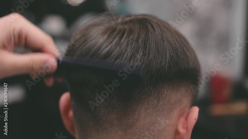 Man haircut in barbershop. photo