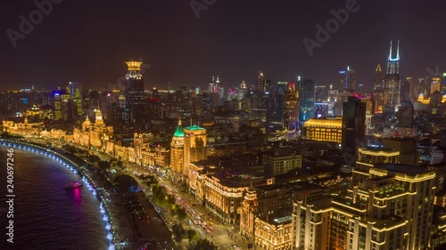 China Shanghai Aerial v51 Hyperlapse at night, birdseye high to low over river to cityscape views 10/18 photo