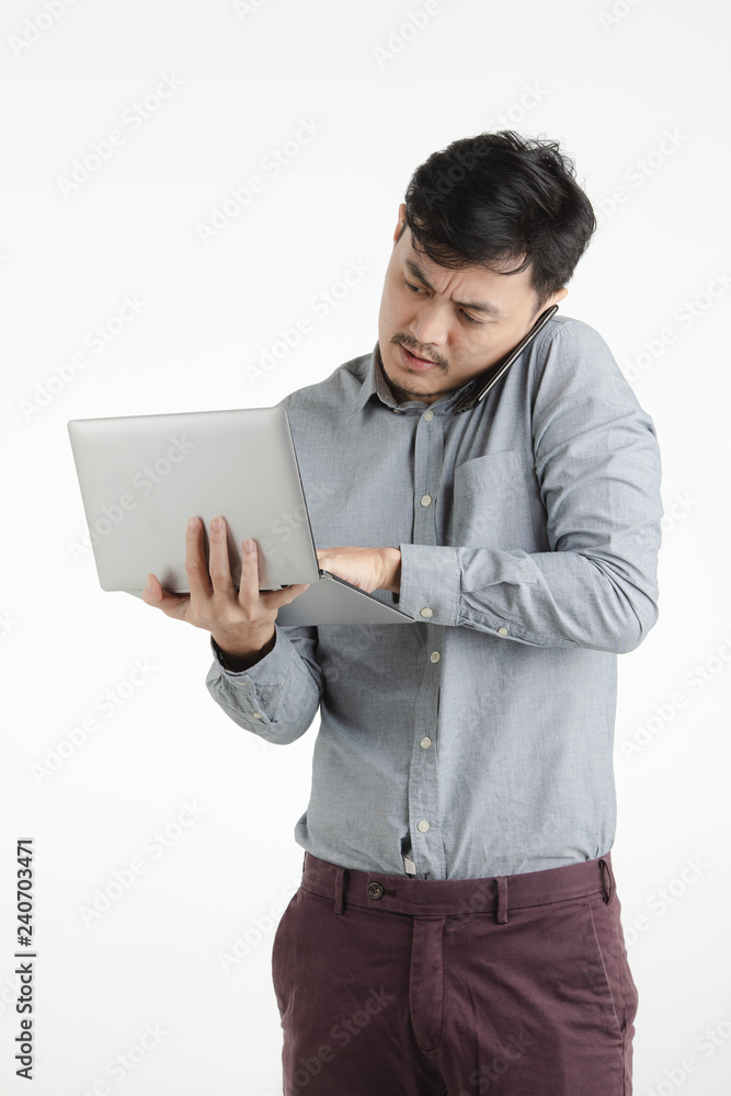 asian young man using notebook asian young man using notebook