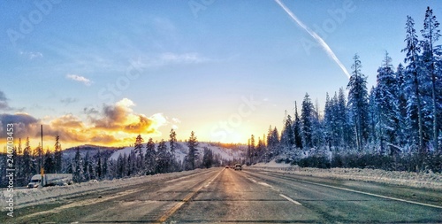Majestic winter landscape glowing by sunlight at Golden Hour. Dramatic wintry scene. Boreal California