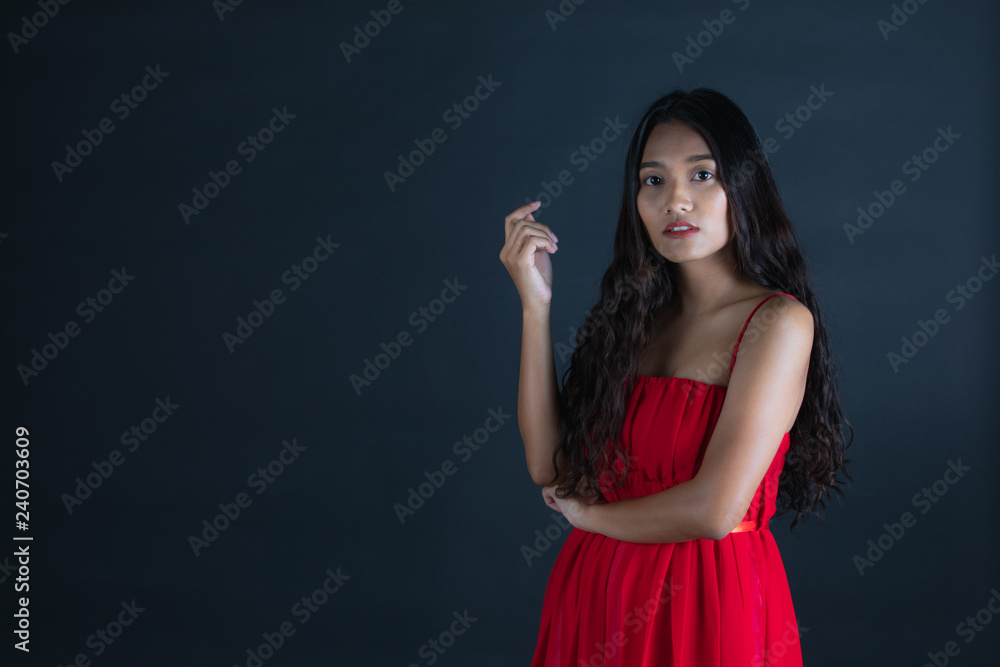 young beautiful Asian woman in red dress young beautiful Asian woman in red dress