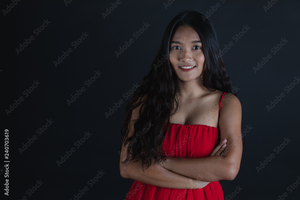 young beautiful Asian woman in red dress young beautiful Asian woman in red dress