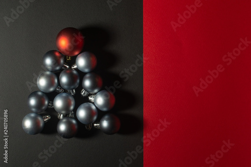 Christmas baubles creative decoration concept of Christmas tree with the black background