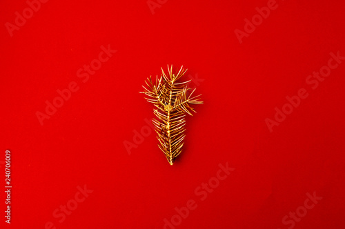 Creative pattern with golden Christmas tree branch. Concept