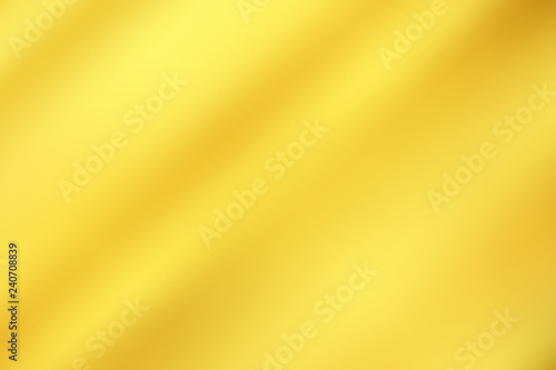 Abstract gold gredient metal color theme satin texture background. Lighting effects of flash. Blurred vector background with light glare.