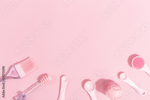 Kitchenware and toolson a pink background