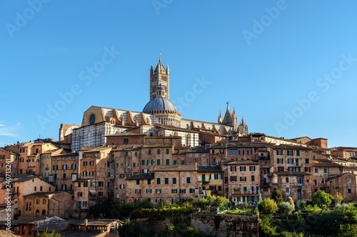 View on Siena with Dome and Bell Tower of Siena Cathedral or Duomo di Siena from Basilica di San Domenico. Italy © Elena Odareeva