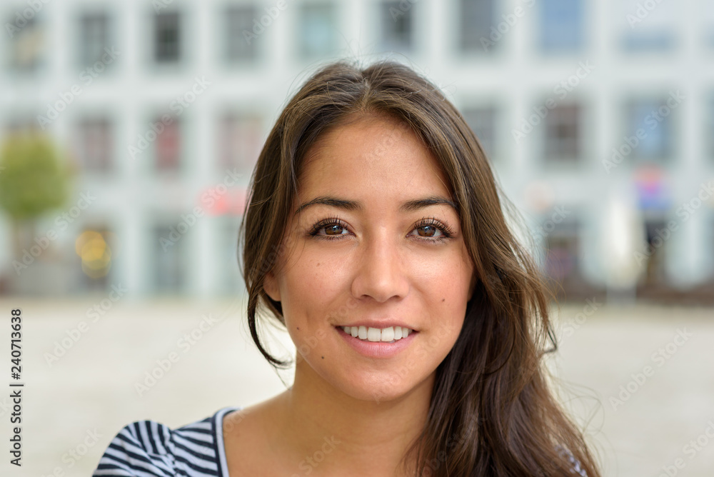 Beautiful smiling brunette woman bust portrait