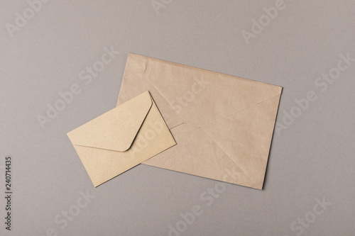 Brown craft envelopes on gray backgrounds