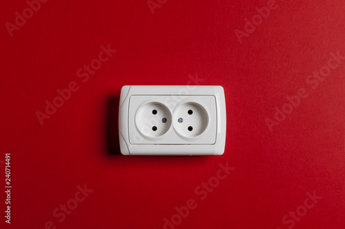 socket on red wall