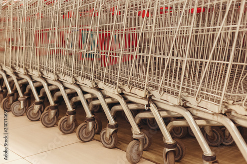 Carts consumer for supermarkets stand in shop
