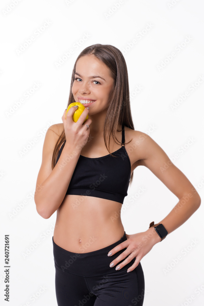 Healthy female body with apple. Healthy fitness and eating lifestyle concept. Healthy female body with apple. Healthy fitness and eating lifestyle concept.