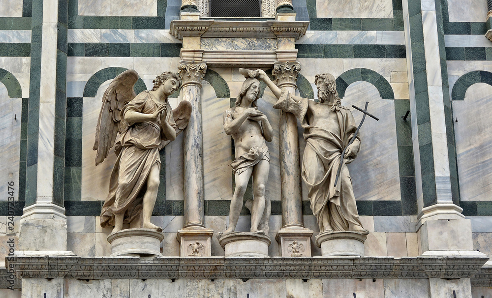 Baptizing. Medieval art. Architectural details of the Baptistery of Saint John, which is one of the oldest buildings in Florence. Italian architecture. Italy, Florence