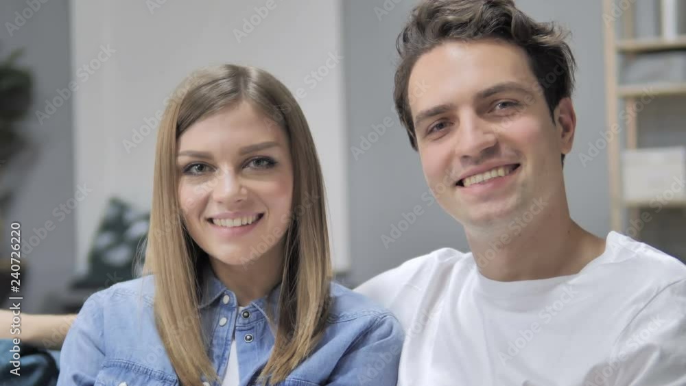 Close Up Smiling Young Couple Looking at Camera Close Up Smiling Young Couple Looking at Camera