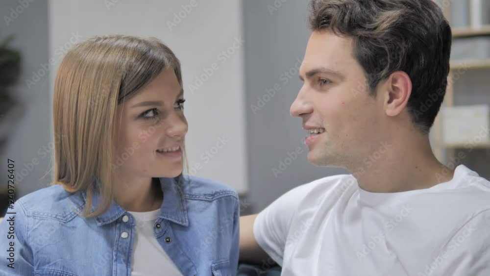 Close up of Talking Young Couple Discussing and Sharing Information Close up of Talking Young Couple Discussing and Sharing Information