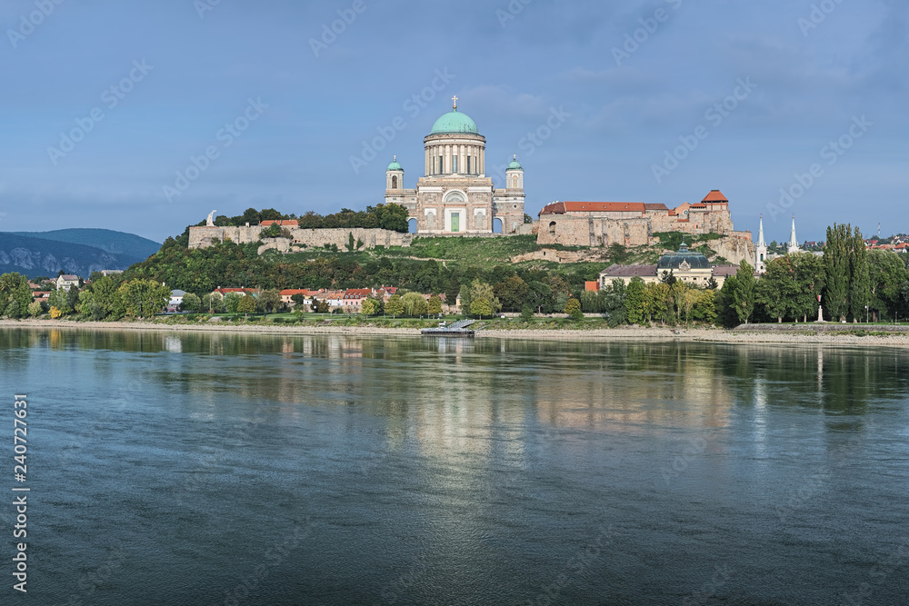 View of the Esztergom Basilica at the Castle Hill from the opposite bank of Danube, Hungary. The Latin motto on the temple frieze reads: Seek those things which are above.