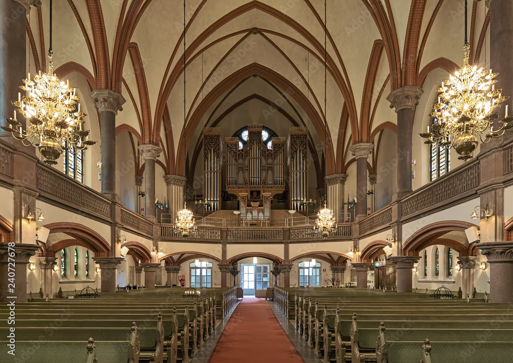 Fototapeta premium Interior of Oscar's Church with main organ in Stockholm, Sweden. The church was built on 1897-1903 by design of Gustaf Hermansson.