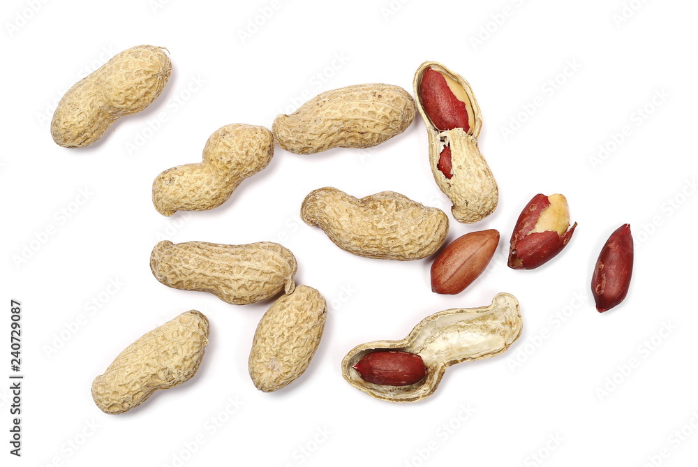 Peanuts with shells isolated on white background, top view Peanuts with shells isolated on white background, top view