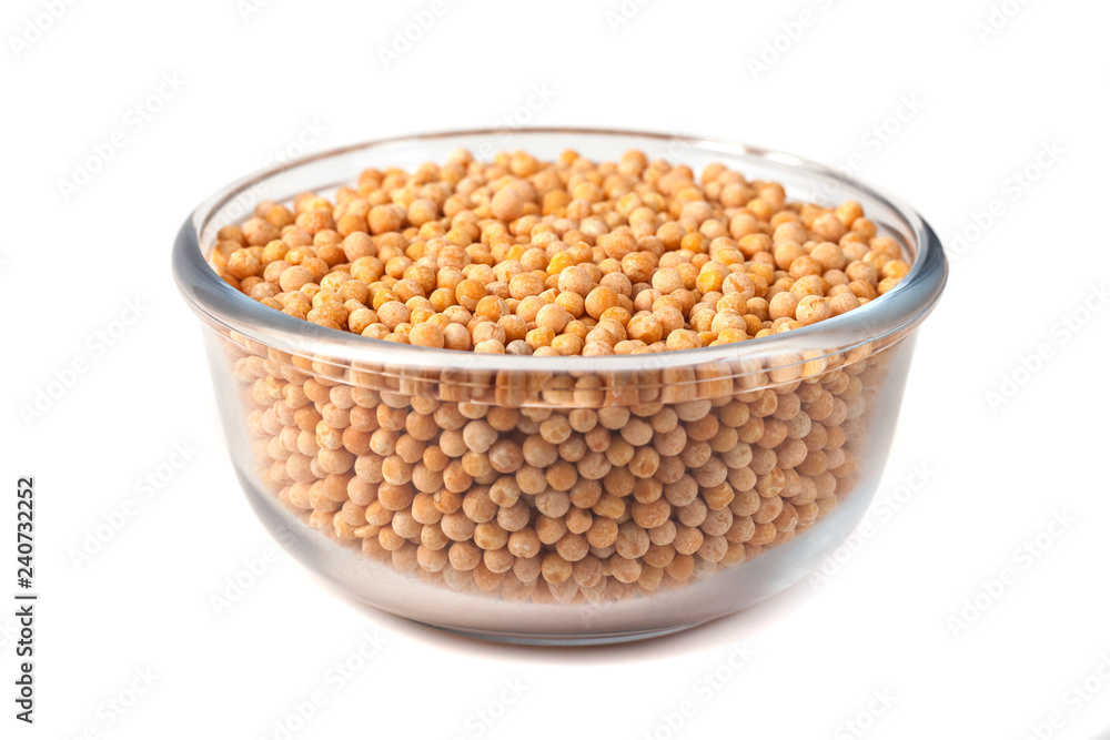 Seeds of peas on glass bowl on white background Seeds of peas on glass bowl on white background