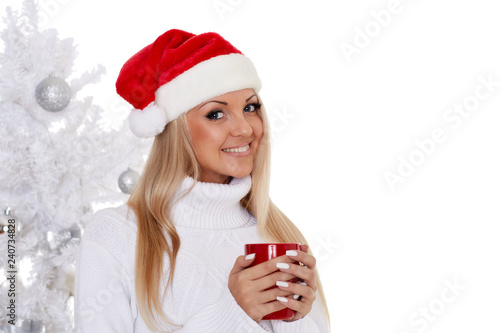 Young woman in Santa Claus cap.